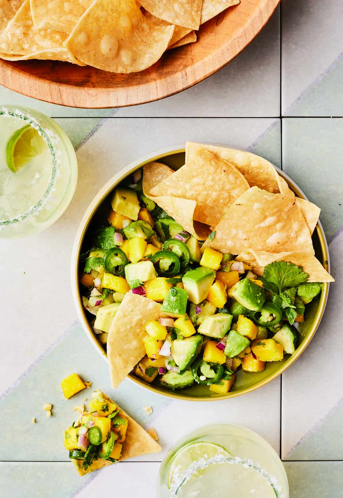 Avocado salsa in a bowl with tortilla chips