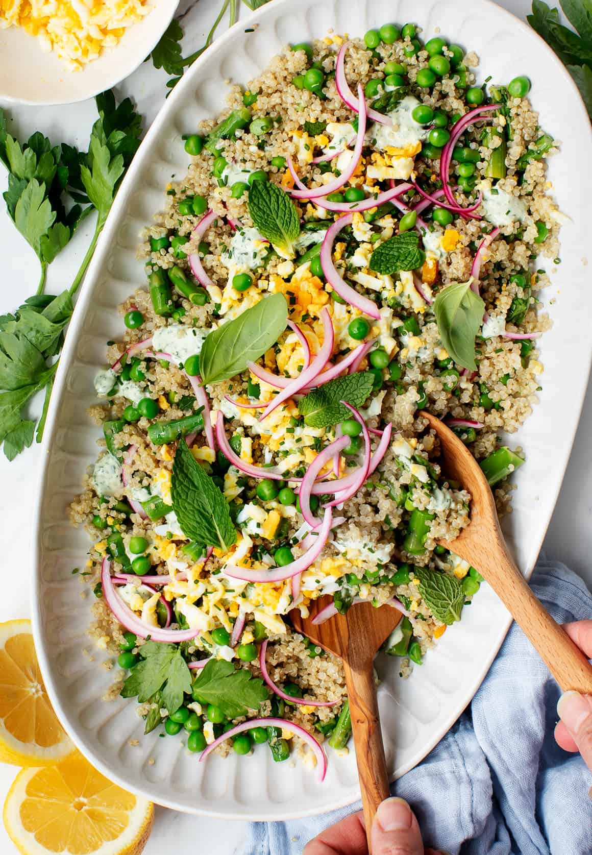 Spring quinoa with grated egg, asparagus, and pickled onions